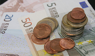 Латвия готова перейти на евро в 2014 году