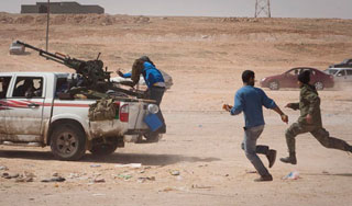 Армия Каддафи атаковала ворота к Бенгази