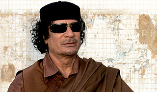 Каддафи осажден в одном из домов Триполи
