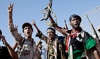 Каддафи застрелил 18-летний солдат